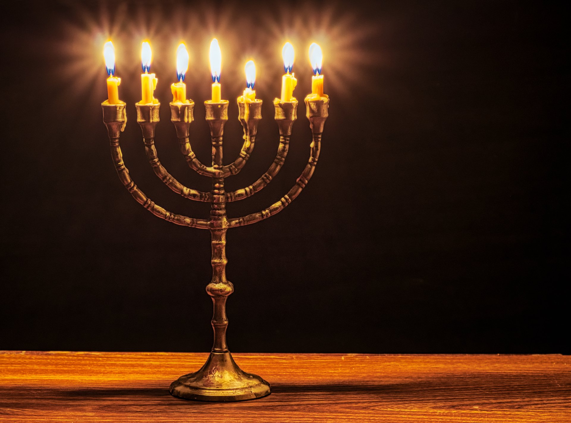 Lit Candles on a Menorah